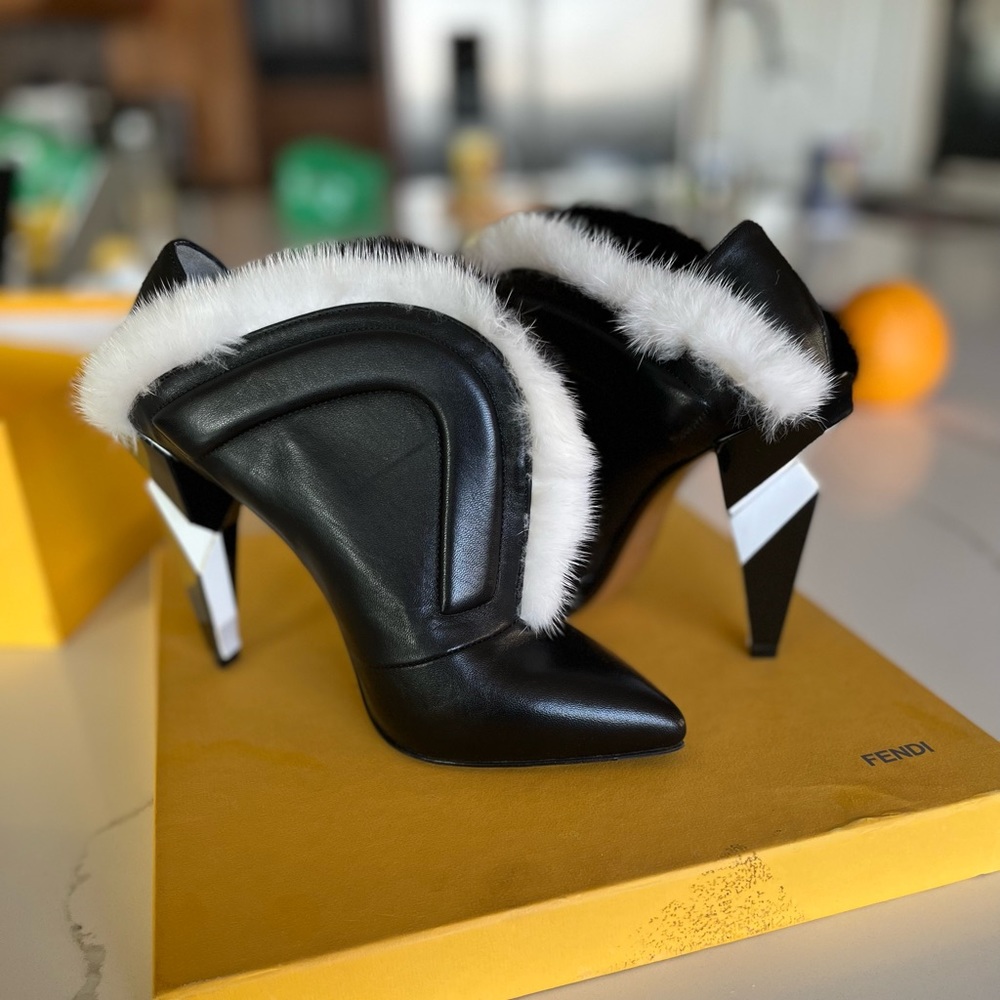 FENDI black mules with geometric heel and black/white fur